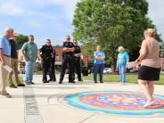 A group learns about the mandala